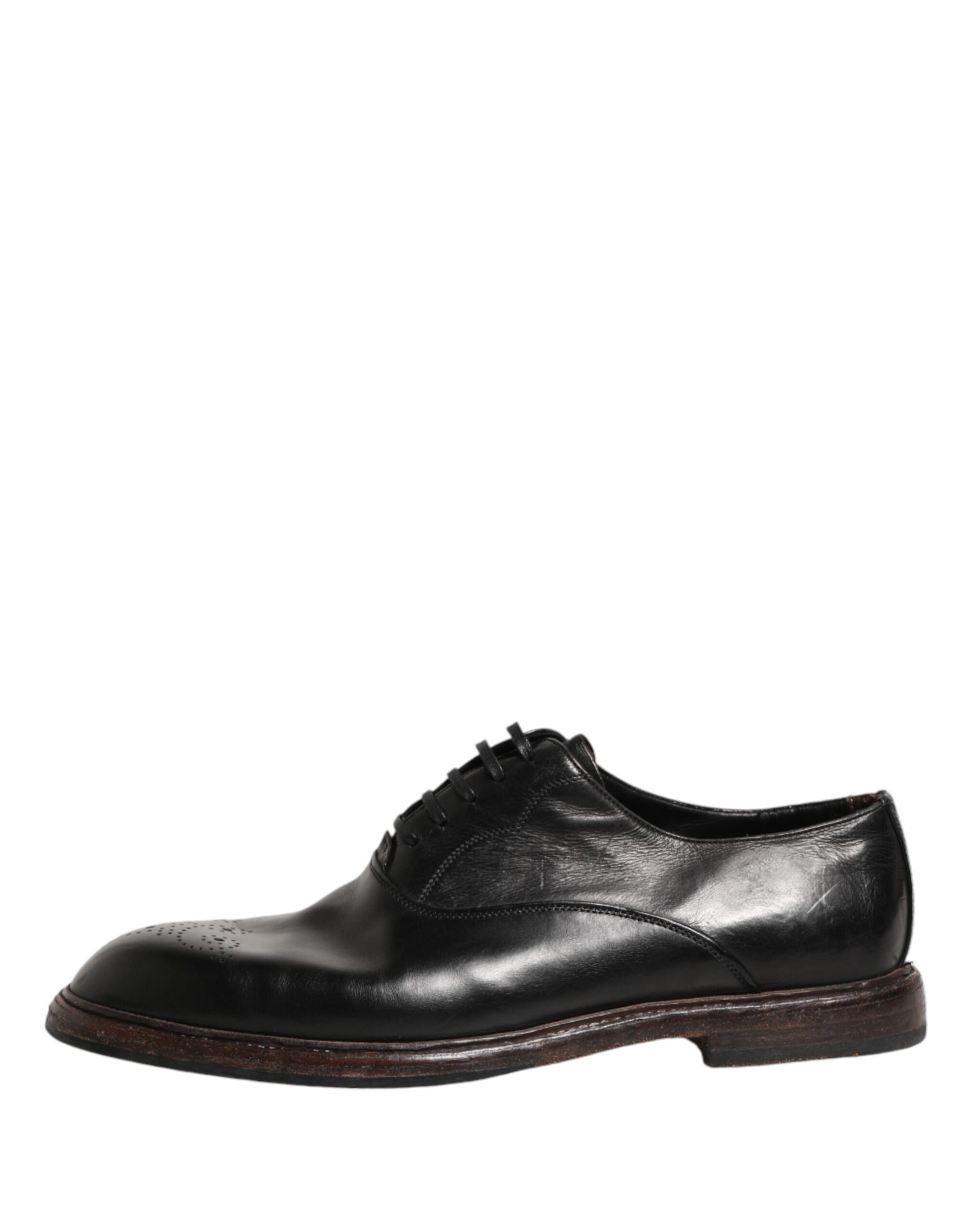 Chaussures Oxford en cuir de veau noir de Dolce & Gabbana, élégantes et classiques pour homme.