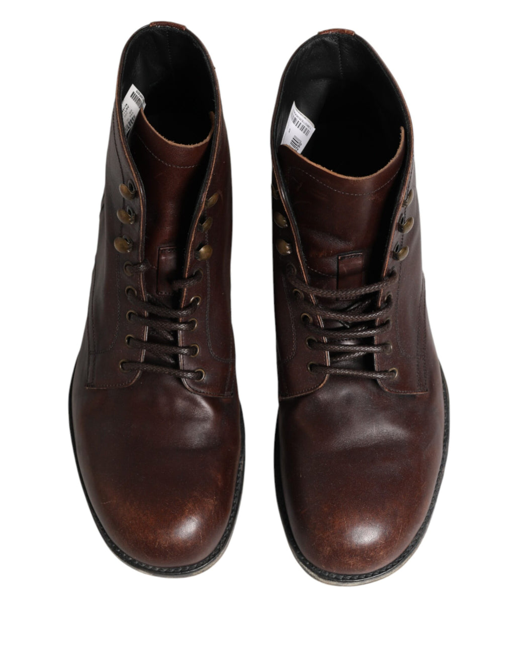 Chaussures homme Dolce & Gabbana, bottines courtes en cuir marron à lacets, talon bas, style élégant et moderne.