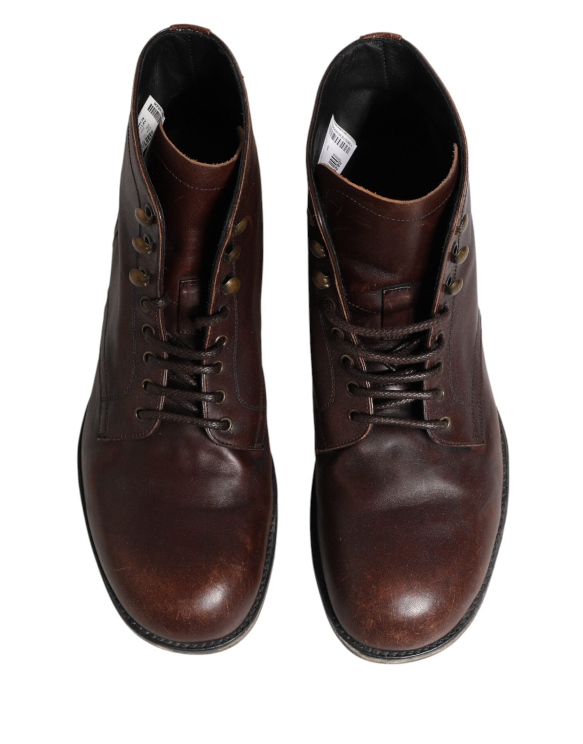 Chaussures homme Dolce & Gabbana, bottines courtes en cuir marron à lacets, talon bas, style élégant et moderne.