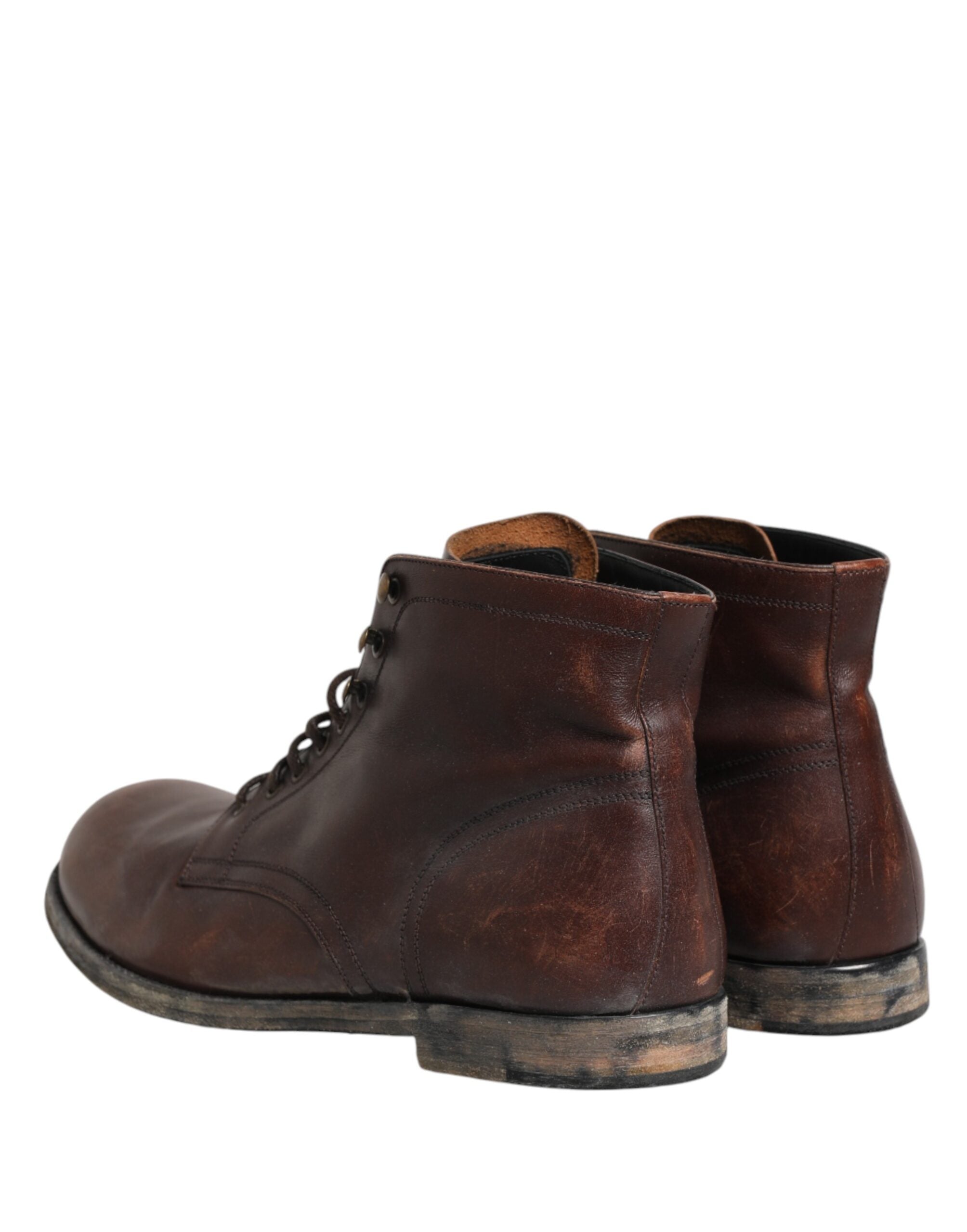 Chaussures pour homme Dolce & Gabbana, bottines courtes en cuir marron à lacets, style élégant et moderne.
