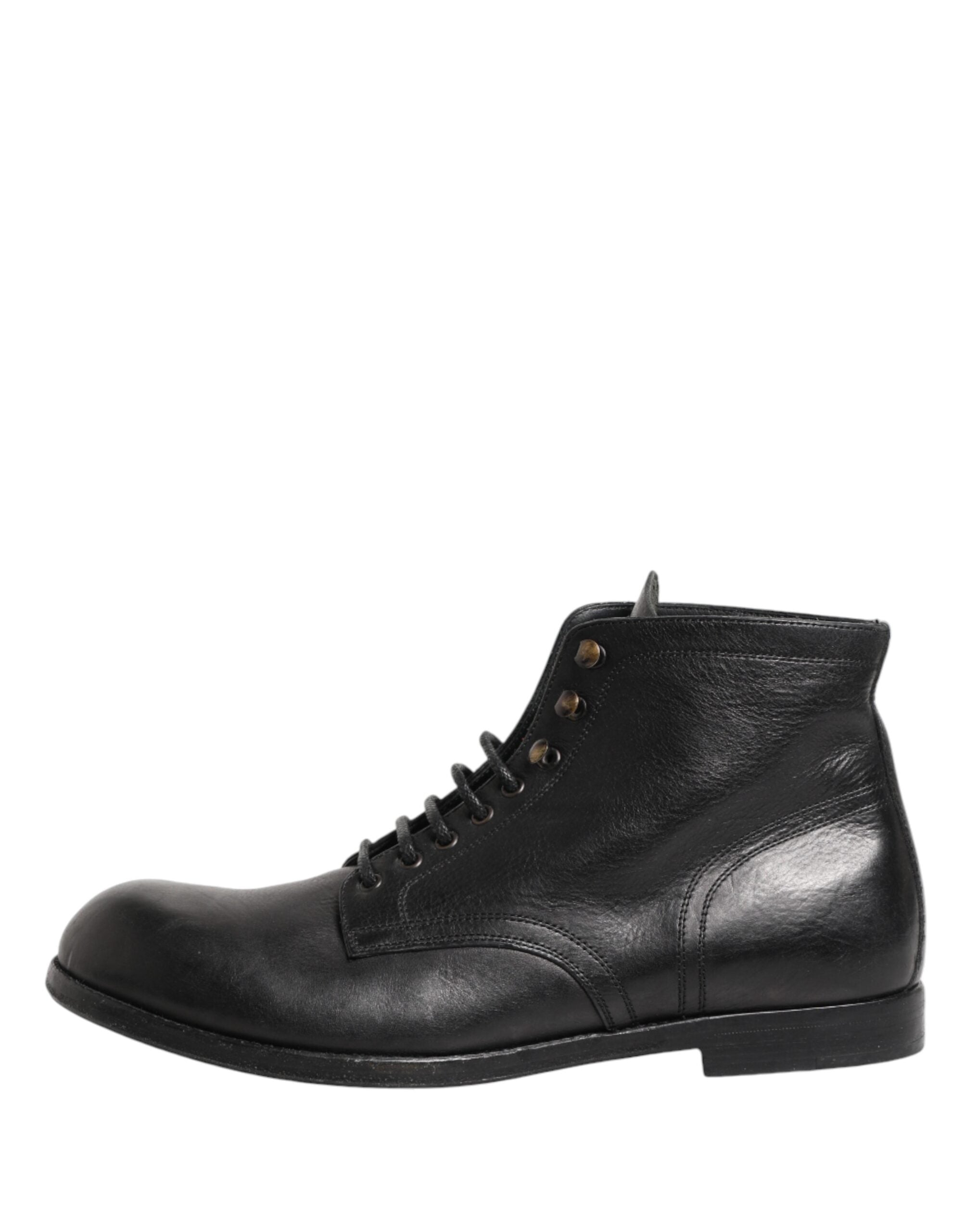 Bottes courtes noires Dolce & Gabbana en cuir avec laçage au niveau de la cheville, chaussures masculines élégantes et modernes.