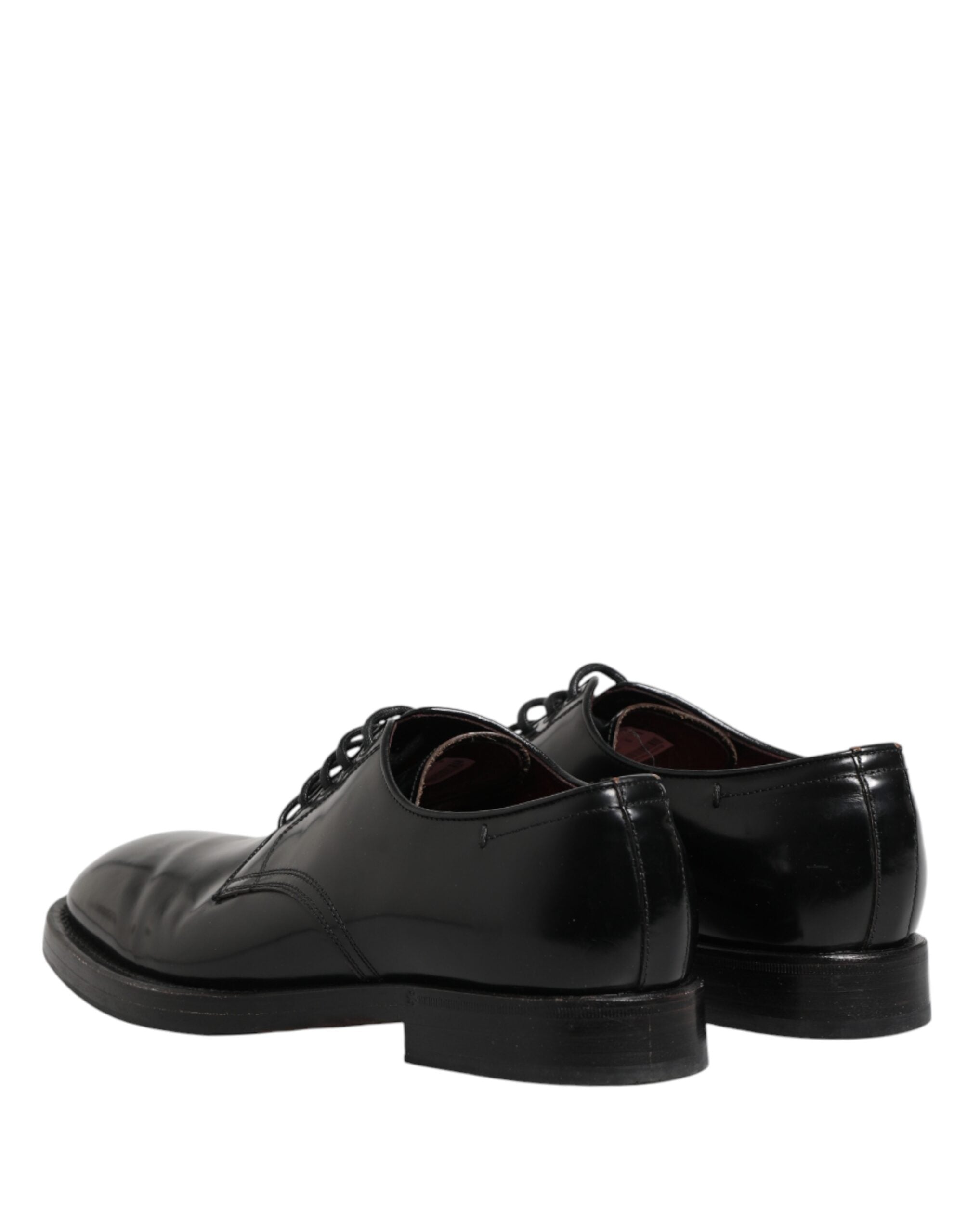Chaussures derby en cuir noir Dolce & Gabbana avec laçage, élégantes et modernes pour hommes.