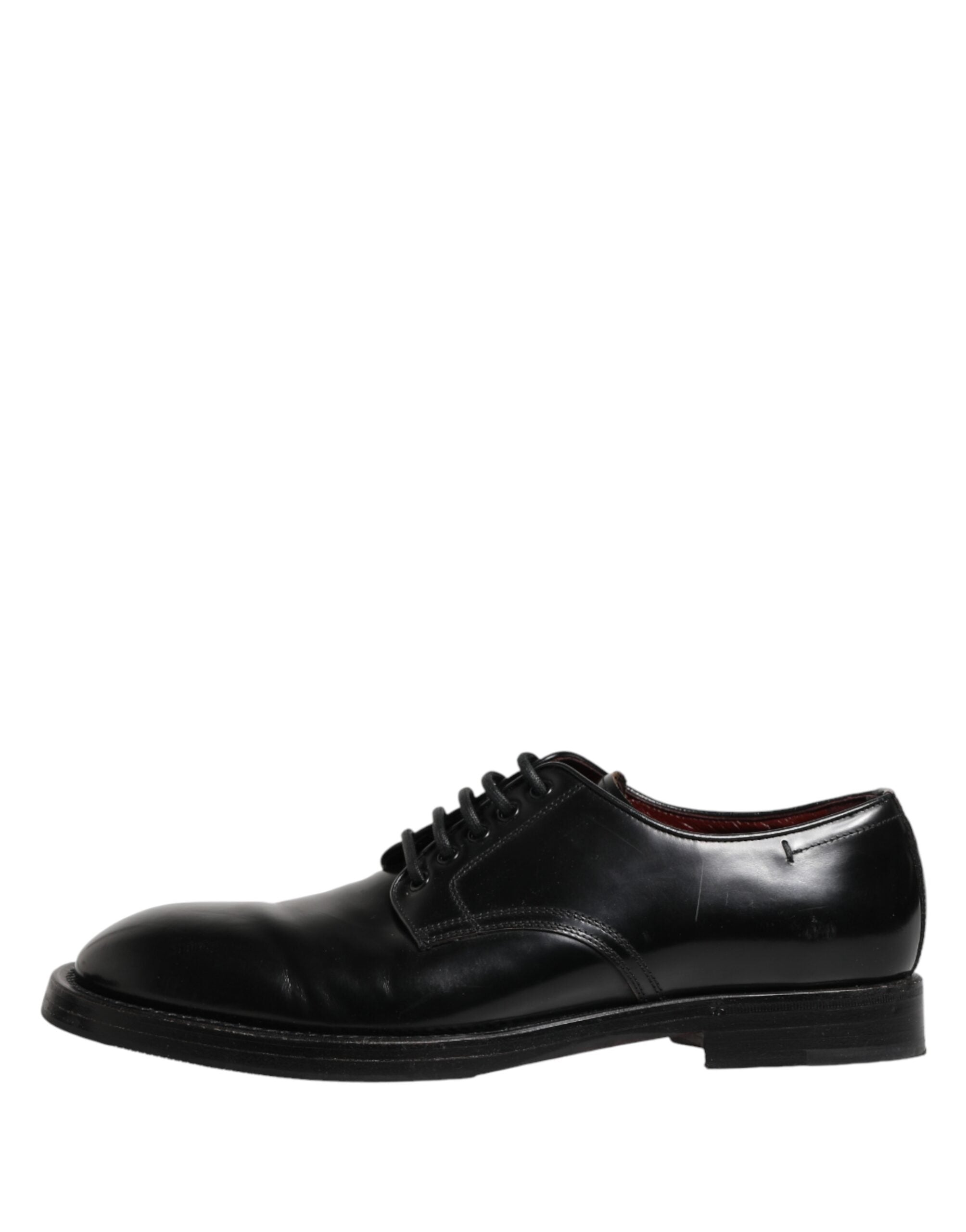 Chaussures Derby en cuir noir Dolce & Gabbana avec laçage pour homme, style élégant et sophistiqué.