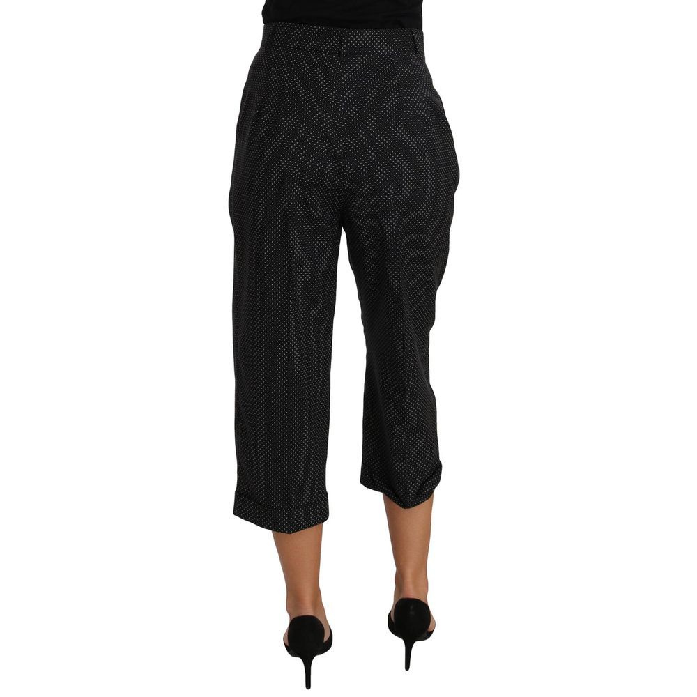 Pantalon noir en coton de Dolce & Gabbana, coupe classique, tissu doux, visible sur fond neutre.
