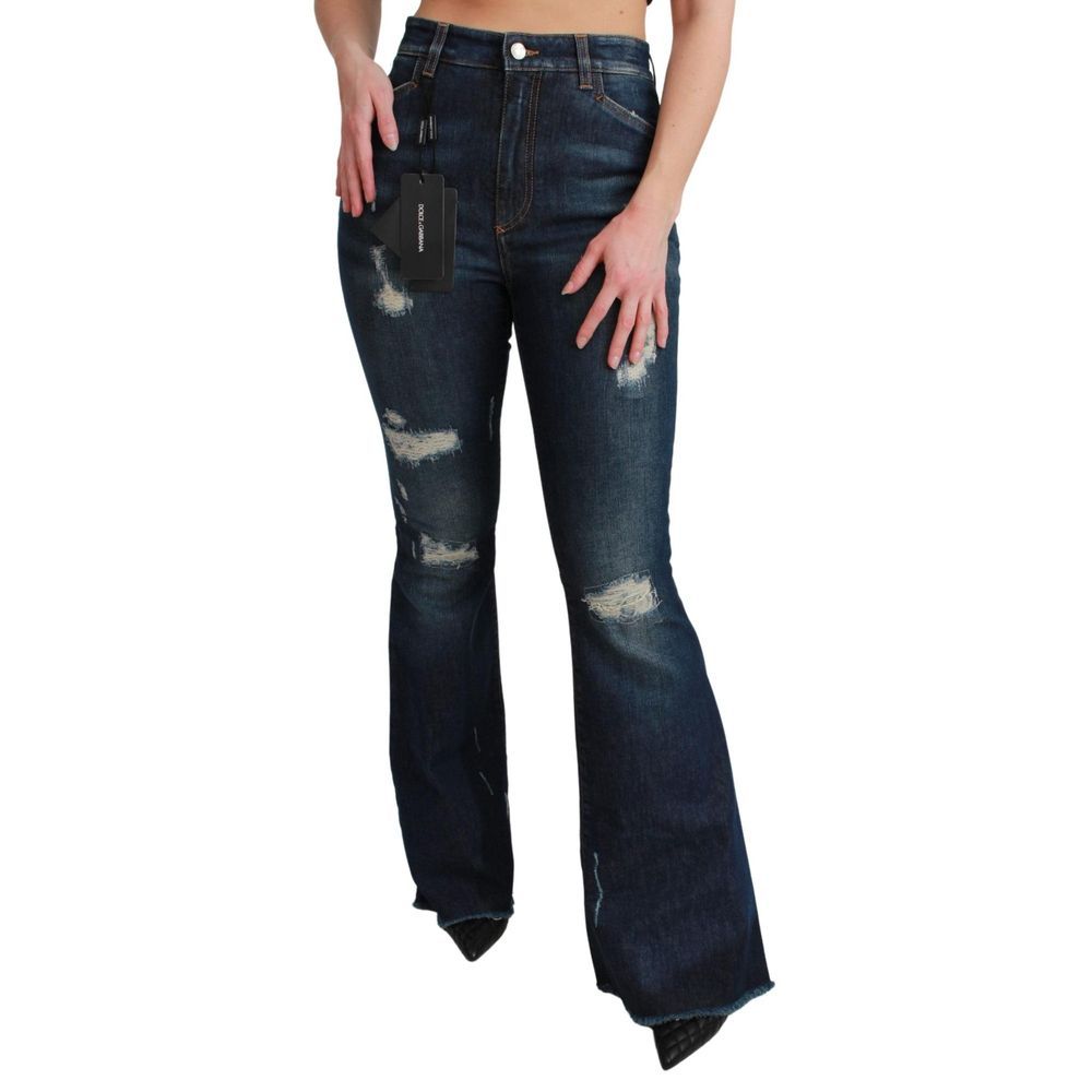 Jeans évasés en coton bleu de Dolce & Gabbana, coupe flared et style tendance, visibles sur l'image.