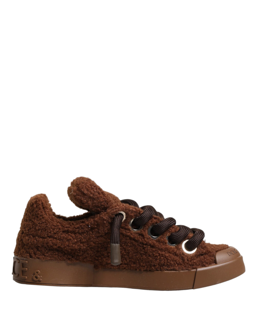 Chaussures sneakers basses Dolce & Gabbana en fausse shearling marron, design élégant avec détails en cuir et semelle blanche.