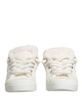Chaussures basses blanches Dolce & Gabbana en fausse shearling, sneakers élégants en cuir synthétique.
