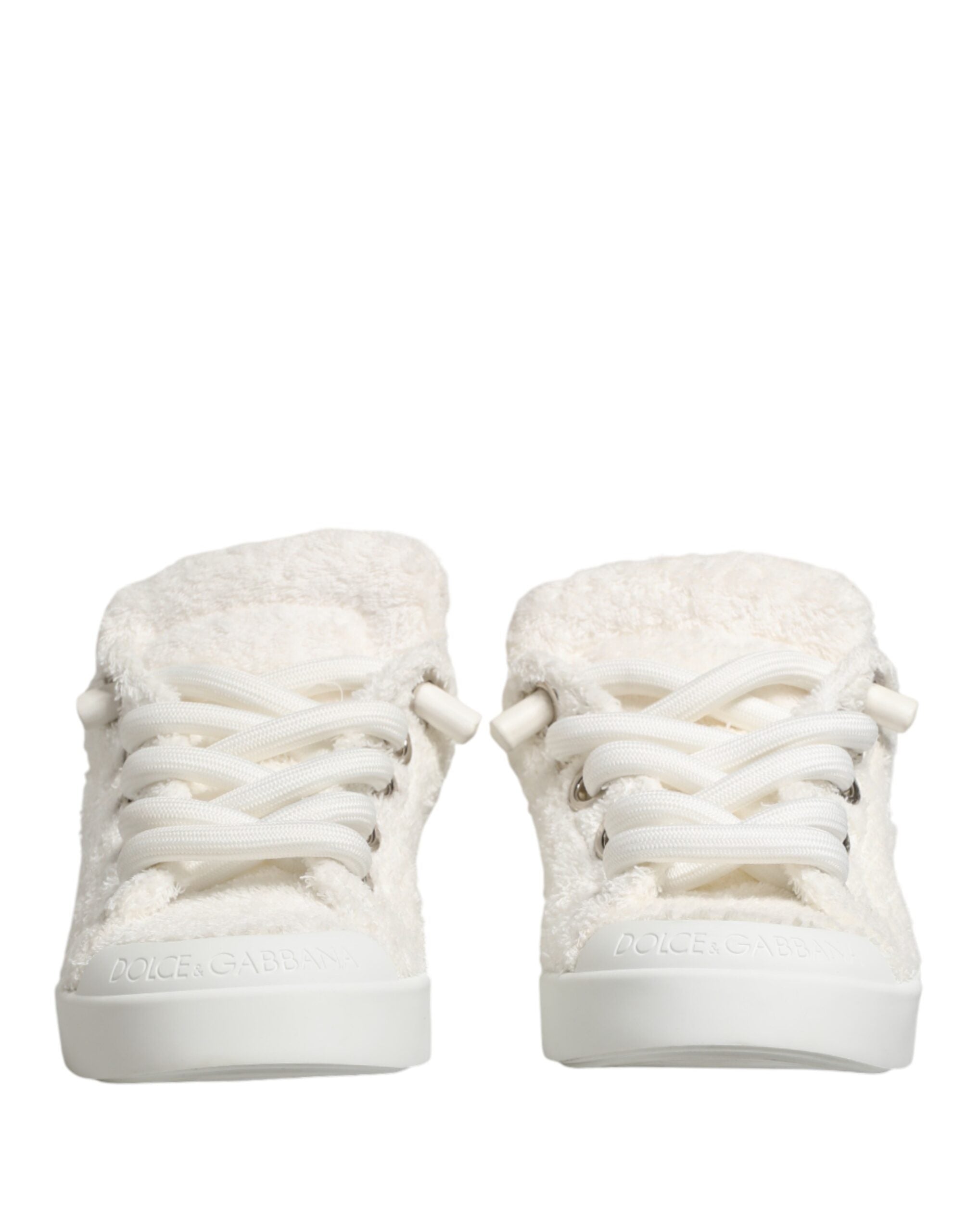 Chaussures basses blanches Dolce & Gabbana en fausse shearling, sneakers élégants en cuir synthétique.