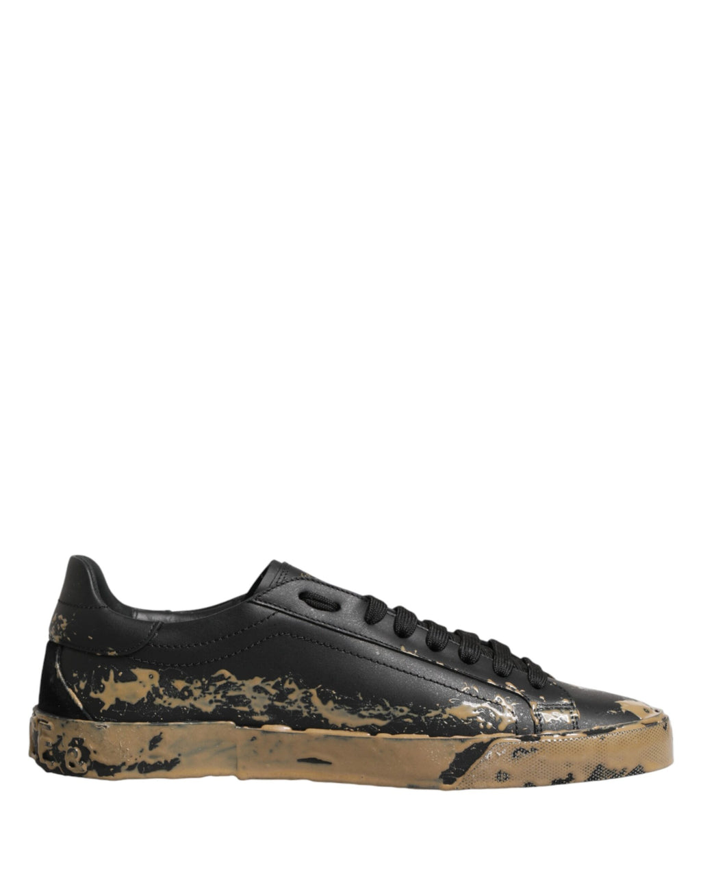 Chaussures basses Dolce & Gabbana Portofino noires avec effet boue, baskets en cuir pour homme, style décontracté et tendance.