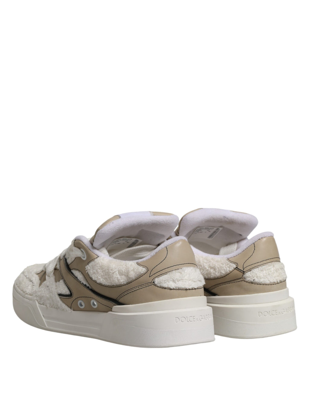 Chaussures sneakers basses Dolce & Gabbana en fausse shearling blanc et beige, style décontracté et confortable.