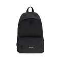 Sac à dos en polyamide noir Balenciaga avec logo discret, poche zippée et bretelles réglables.