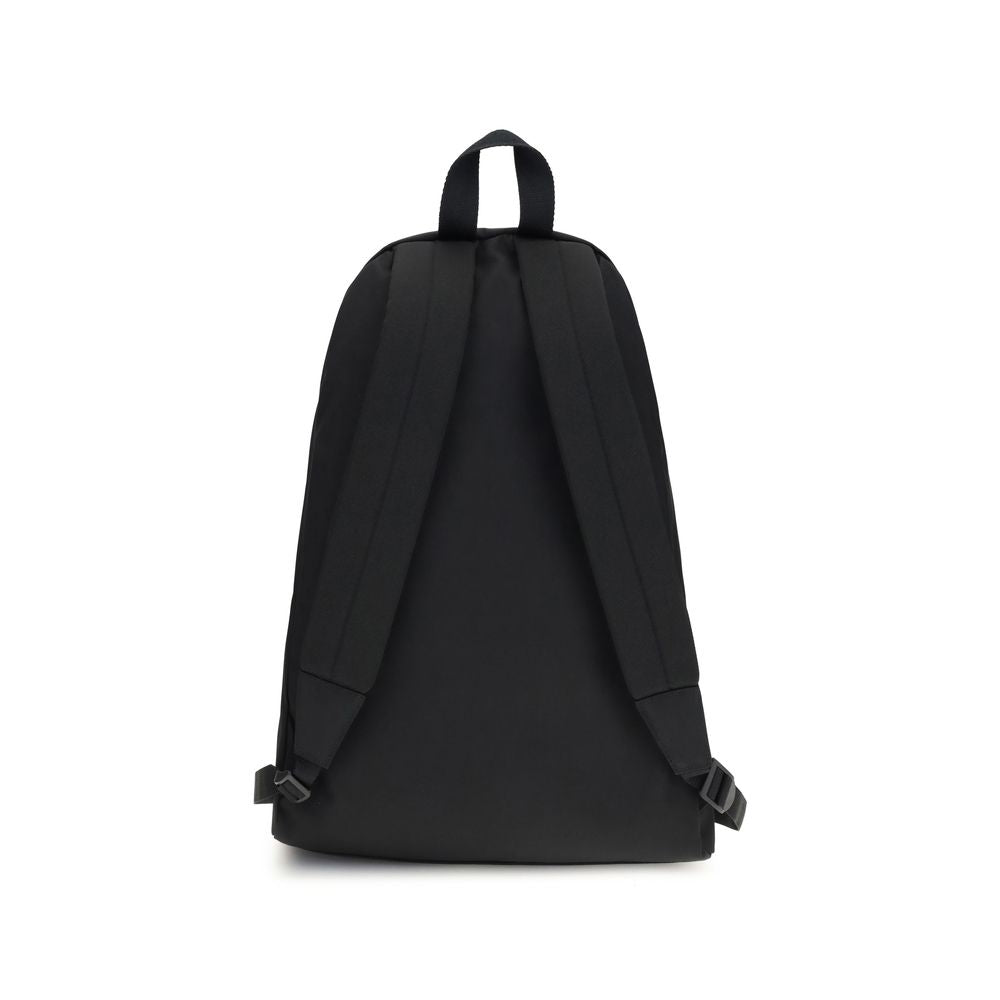 Sac à dos Balenciaga en polyamide noir avec détails modernes, vue de face montrant les poignées et les zips.