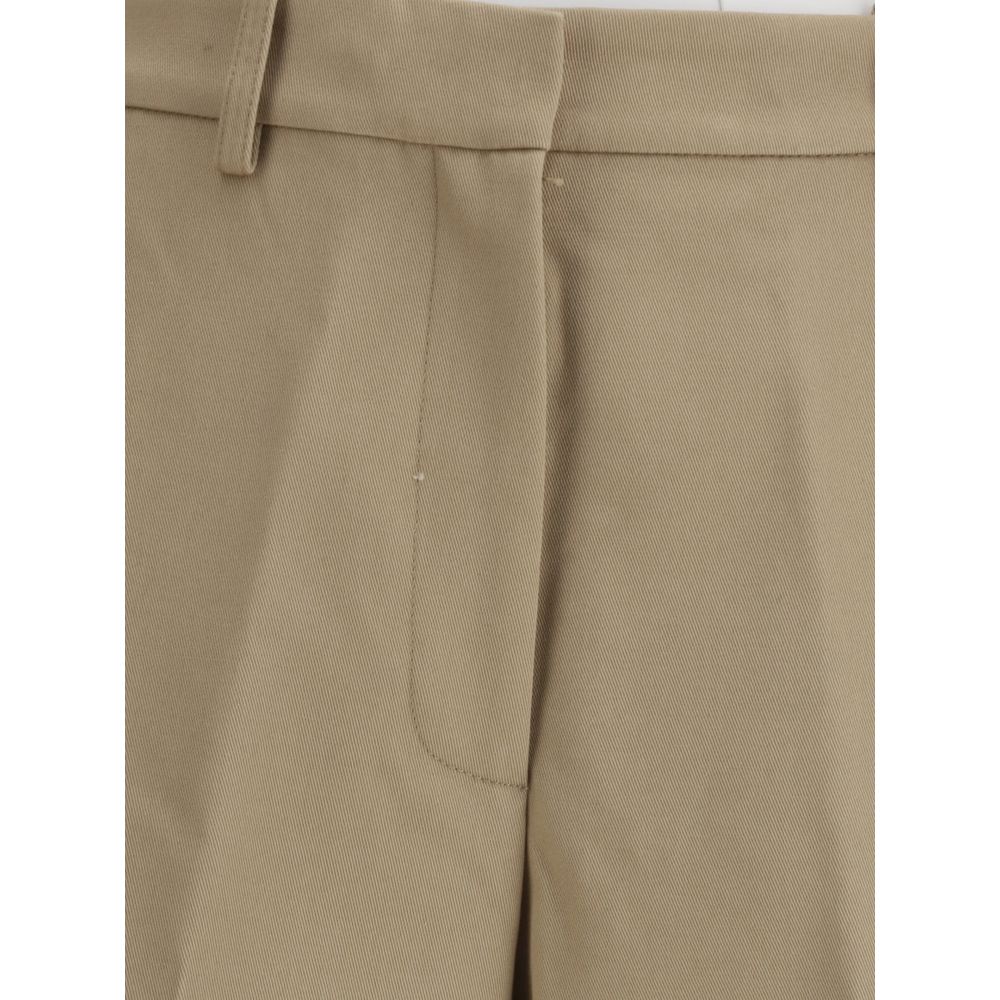 Pantalon cargo beige en coton de la marque Givenchy, visible avec détails pratiques et coupe décontractée.
