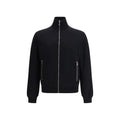 Veste Prada en laine noire Oves Aries, coupe élégante, avec détails modernes et logo discret, portée sur un mannequin.