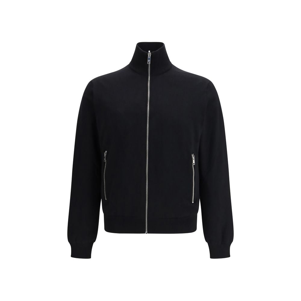 Veste Prada en laine noire Oves Aries, coupe élégante, avec détails modernes et logo discret, portée sur un mannequin.