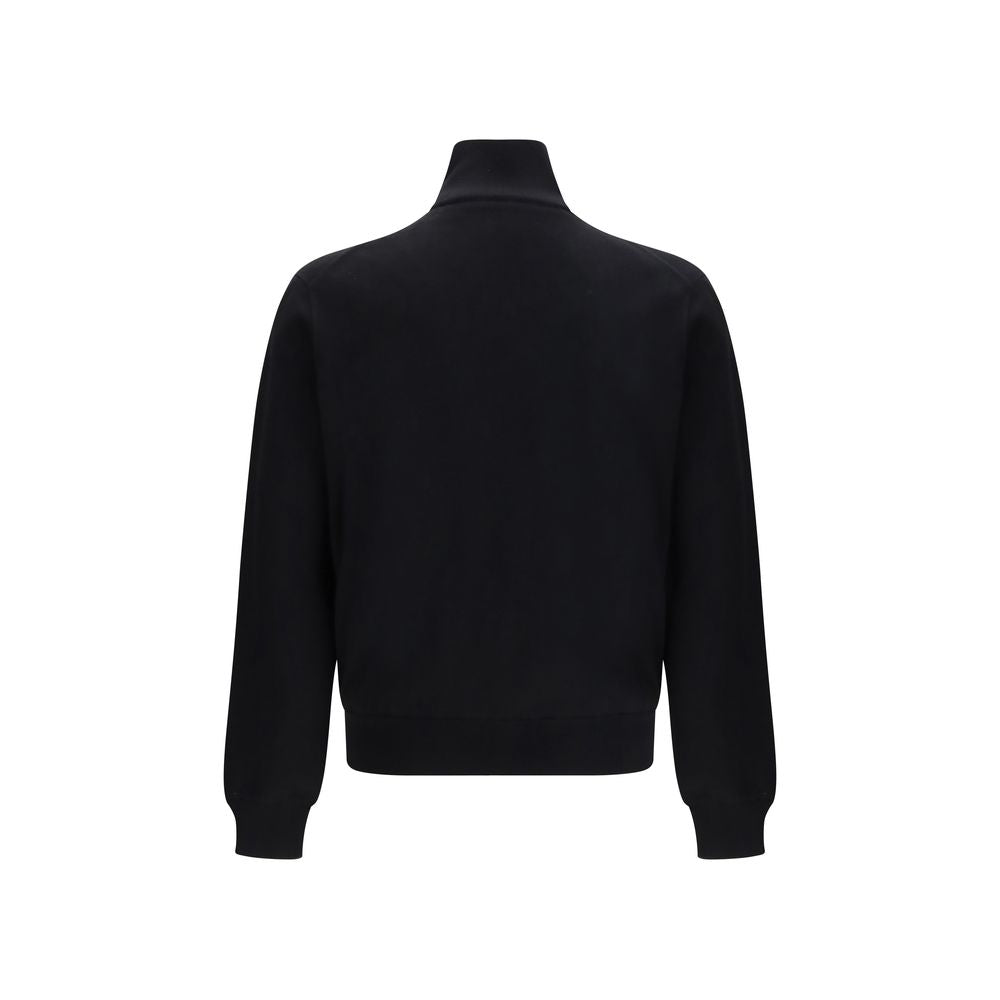 Veste Prada en laine noire Oves Aries, coupe moderne, avec détails élégants et fermeture à boutons, portée sur un mannequin.
