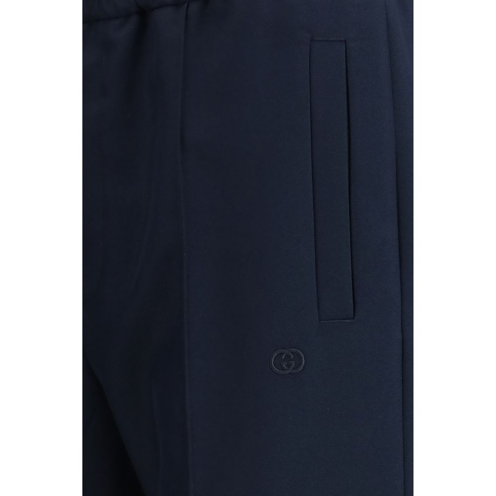 Pantalons décontractés en polyester bleu de Gucci, coupe confortable, avec détails modernes pour un style élégant et casual.