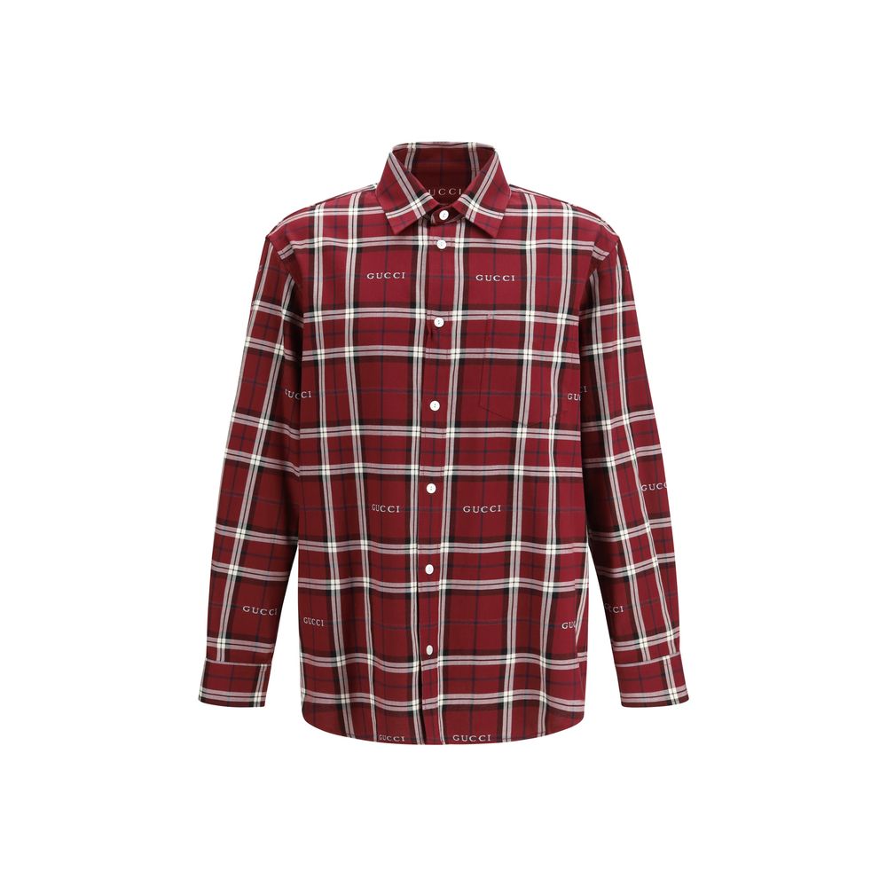 Chemise Gucci en coton multicolore avec motif coloré, détails élégants et coupe classique visible sur l'image.