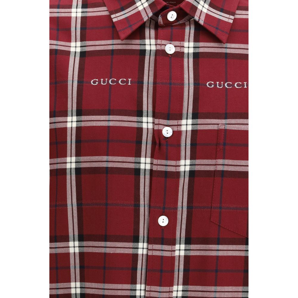 Chemise en coton multicolore Gucci avec motif coloré, boutons et col classique, vue de face.