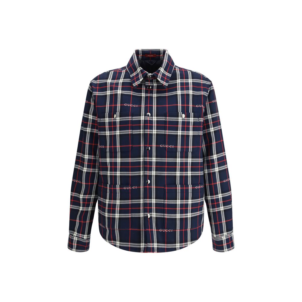 Veste en coton bleue Gucci pour homme, coupe classique, visible avec col et boutons, style élégant et décontracté.