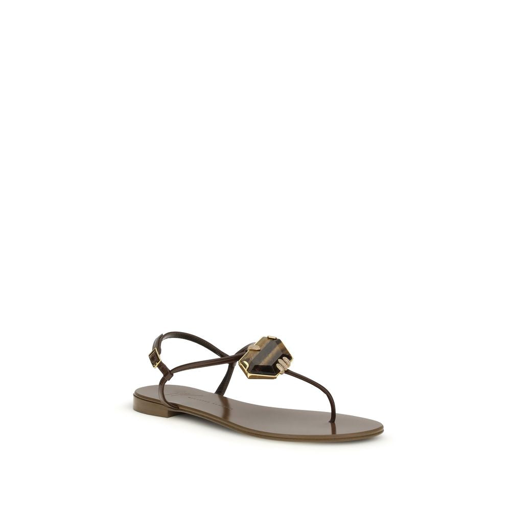 Sandales plates en acier inoxydable marron de Giuseppe Zanotti, vue détaillée du style élégant et moderne.