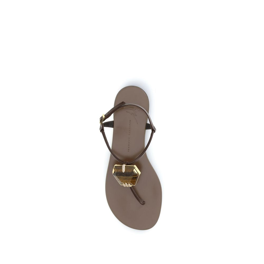 Sandales plates en acier inoxydable marron de Giuseppe Zanotti, vues de dessus, avec lanières élégantes en cuir.