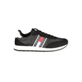 Sneakers hommes en polyuréthane noir de Tommy Hilfiger, style moderne avec semelle blanche et design élégant.