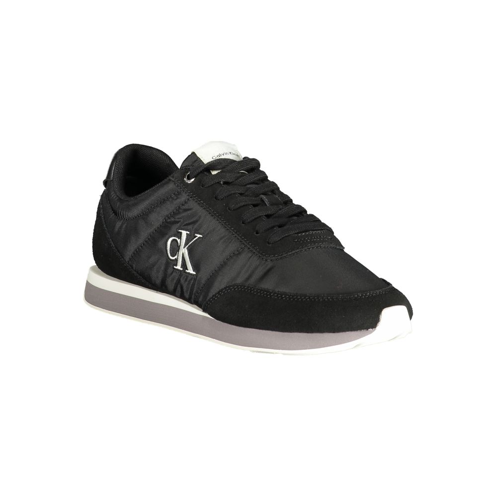 Chaussures de sport noires pour homme de marque Calvin Klein en polyester, vue de côté.