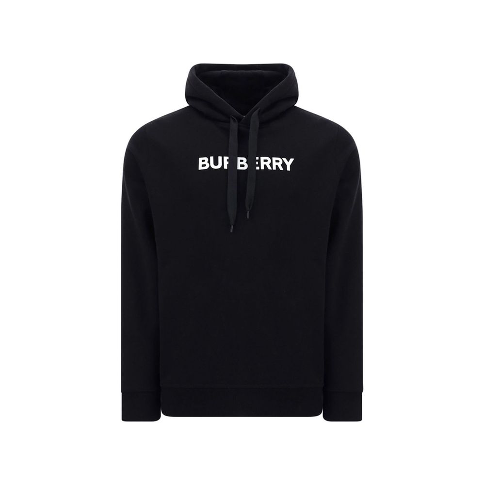 Sweat-shirt en coton noir de la marque Burberry, avec logo discret visible sur la poitrine, porté par un mannequin.