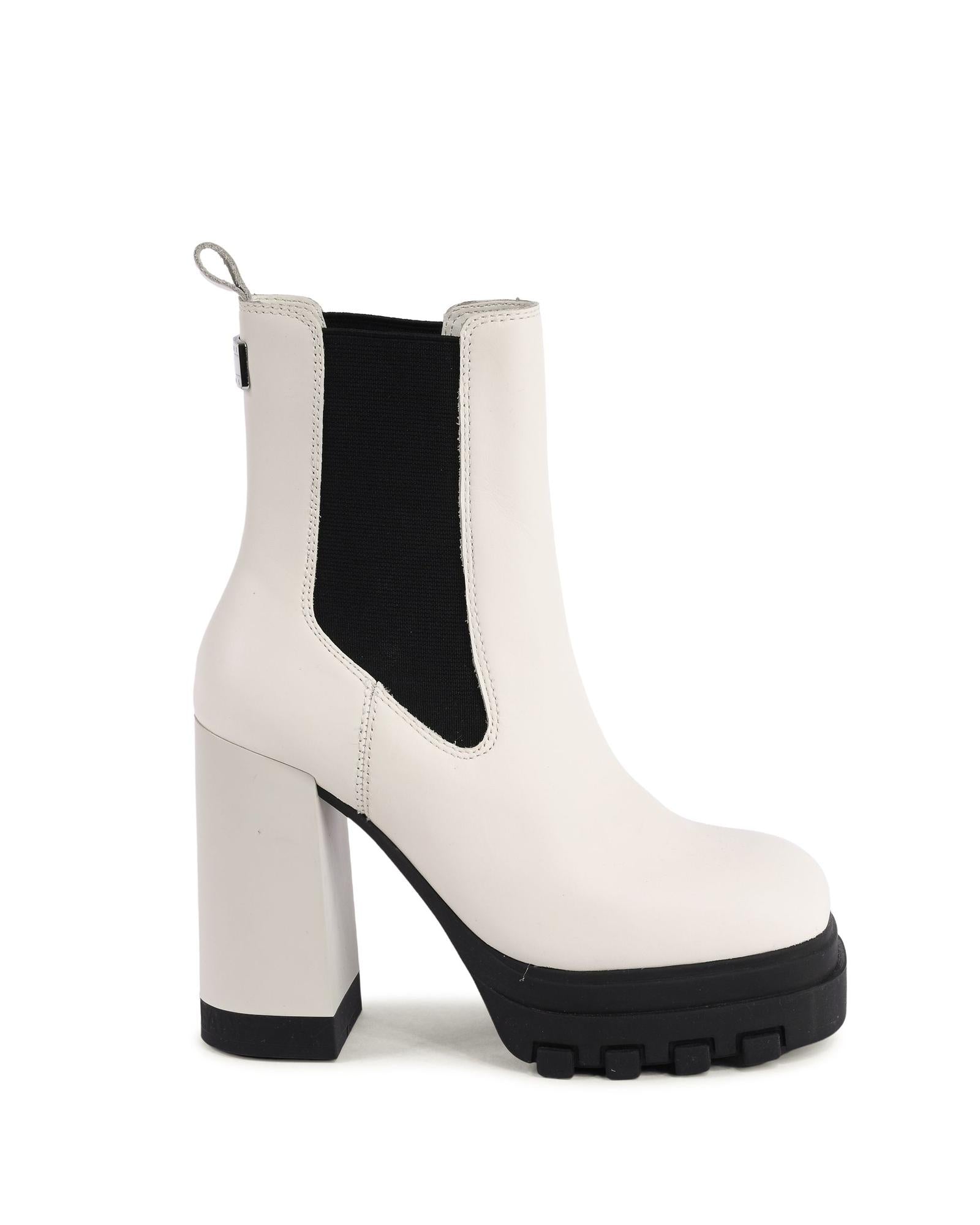 Bottes en cuir blanc Tommy Hilfiger pour ankle, avec semelle en caoutchouc et design élégant, visibles sur la photo.