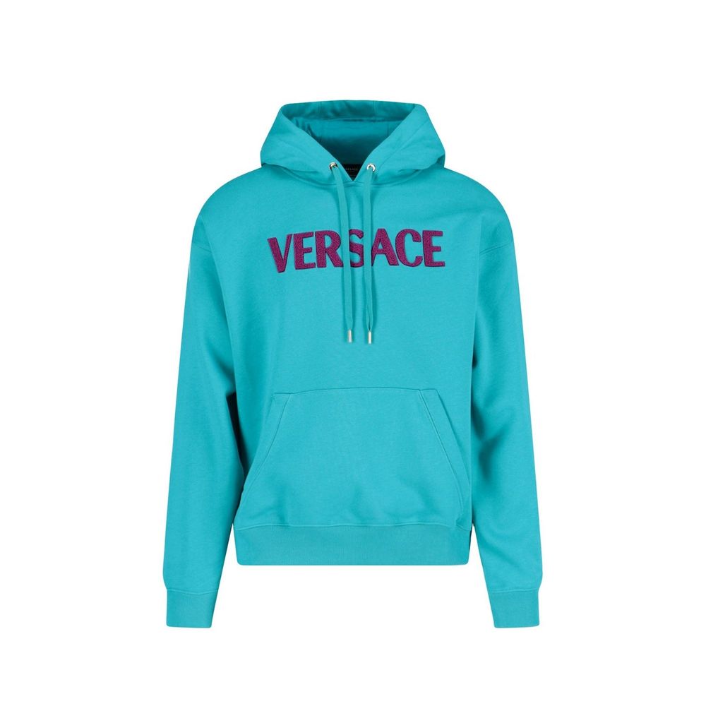 Sweatshirt en coton bicolore de la marque Versace, style décontracté avec logo Versace visible sur le devant.