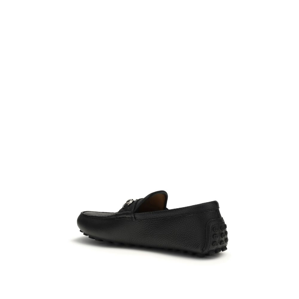 Mocassins Gucci en cuir de veau noir Bos Taurus, chaussons slip-on élégants pour homme, avec finition raffinée et design classique