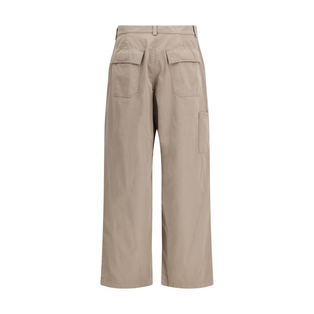 Pantalon décontracté beige en coton de la marque Balenciaga, vue de face, tissu léger et design élégant.