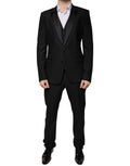 Costume de smoking noir en laine vierge Dolce & Gabbana, veste élégante avec détails sophistiqués.
