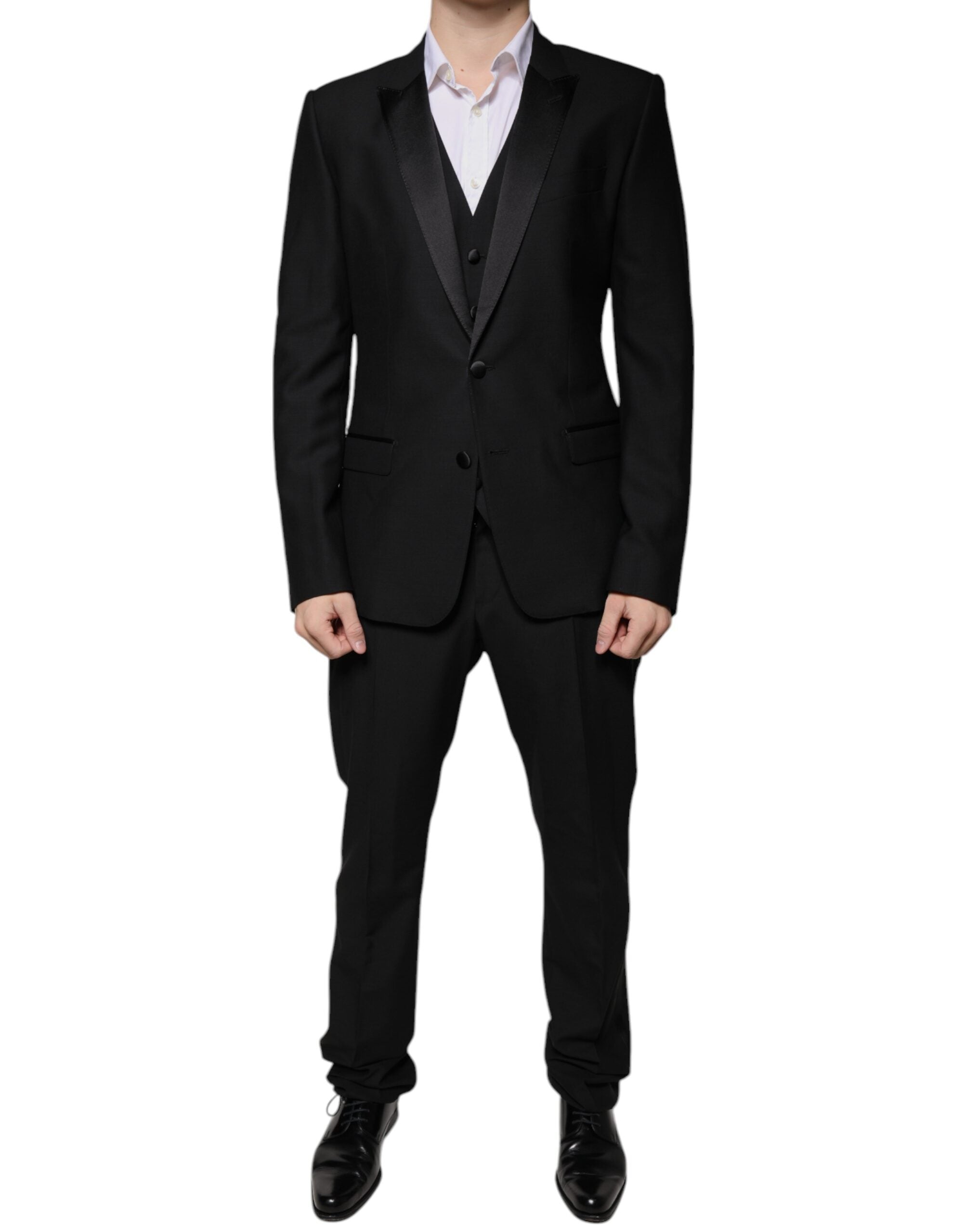 Costume de smoking noir en laine vierge Dolce & Gabbana, veste élégante avec détails sophistiqués.