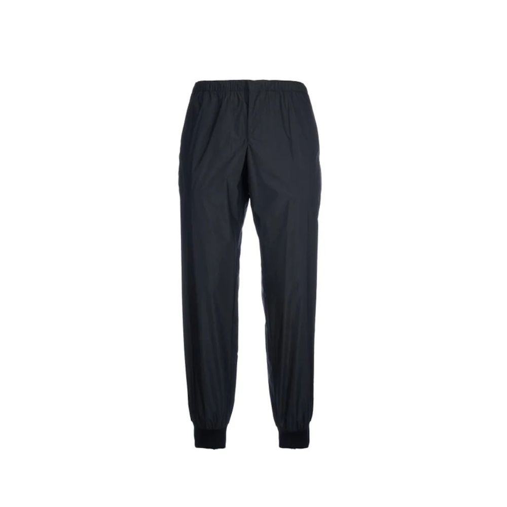 Pantalons de jogging Prada en nylon noir pour sport, avec ceinture élastique et poches latérales, style décontracté et confortable.