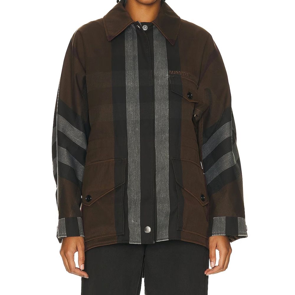 Veste parka marron en coton de Burberry, coupe classique, avec capuche et détails sophistiqués visible sur l'image.
