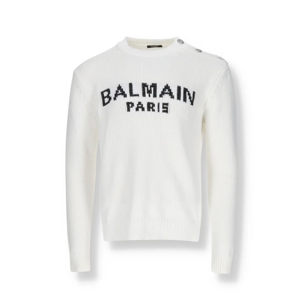 Sweat-shirt blanc en coton de la marque Balmain, vue de face, avec logo discret sur la poitrine.