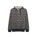 Sweatshirt beige en coton de la marque Balmain, coupe décontractée avec logo discret visible sur le devant.