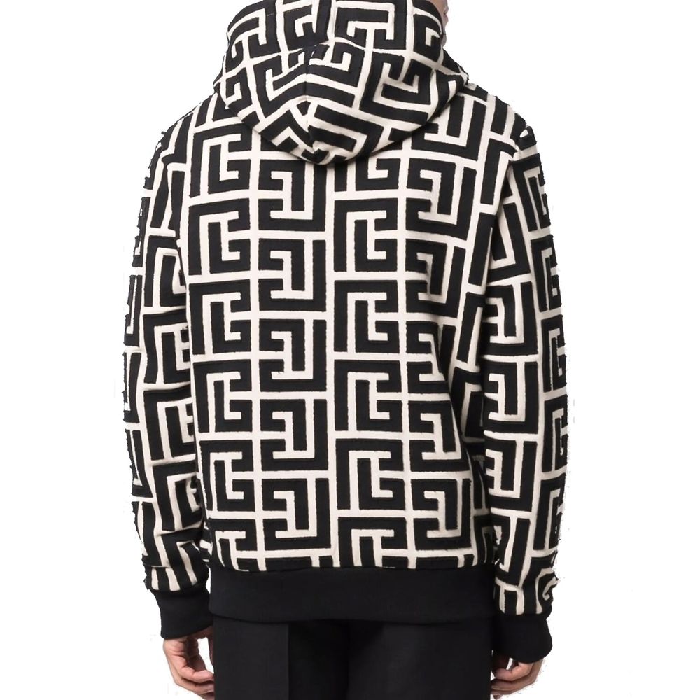 Sweat-shirt beige en coton de la marque Balmain, coupe décontractée, avec logo subtil sur le devant.