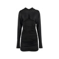 Robe de cocktail noire en viscose de Saint Laurent, coupe élégante et moderne, portée avec un style sophistiqué.