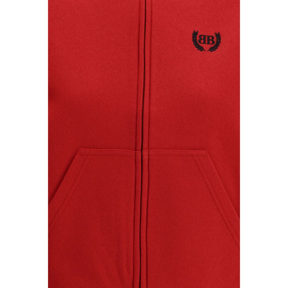 Sweatshirt multicolore en coton de la marque Balenciaga, avec logo et design coloré visible sur le devant.