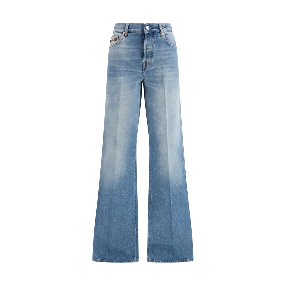 Jeans évasés en coton bleu Gucci, style décontracté, avec coupe fluide et détails modernes, parfaits pour un look tendance.