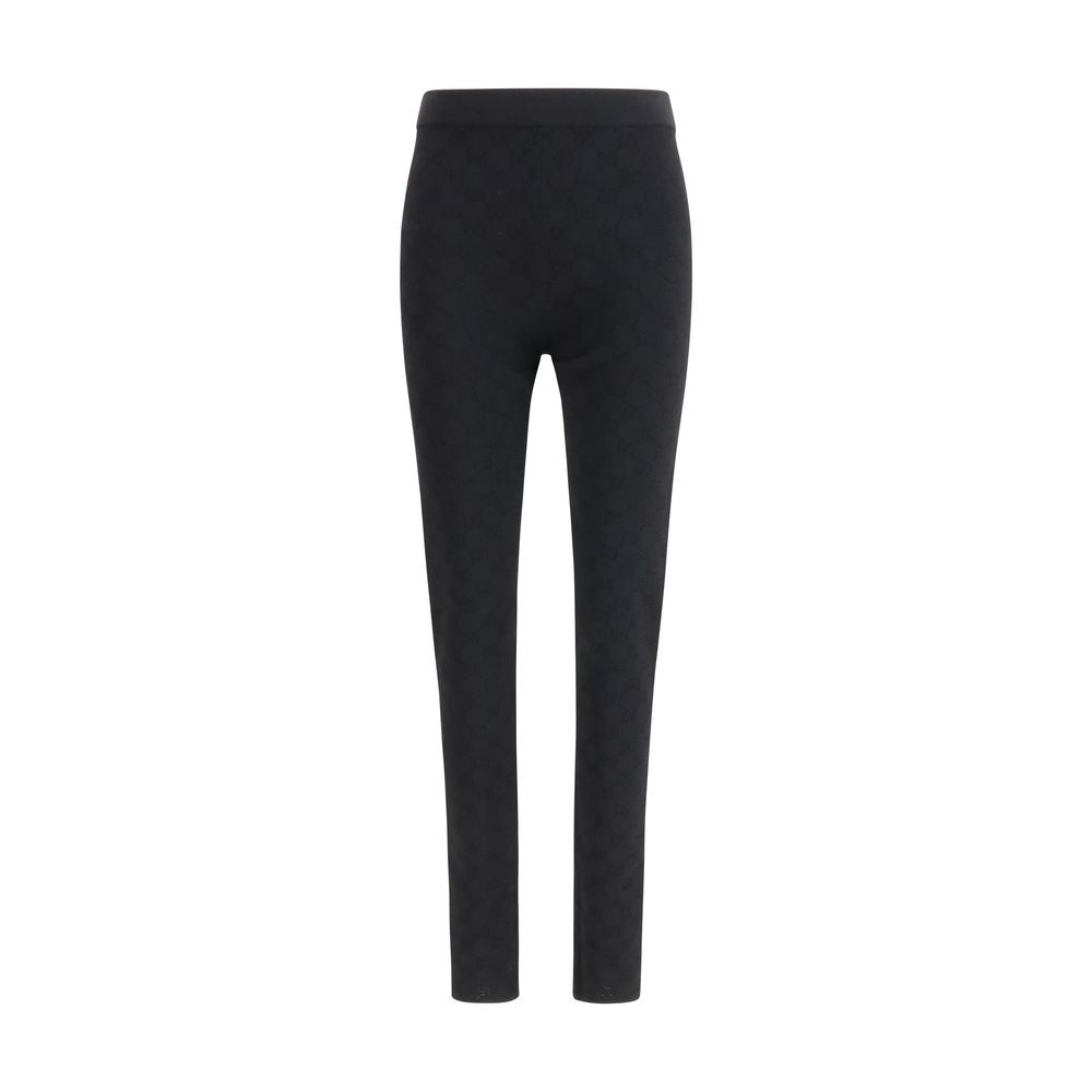 Leggings noires en viscose de Gucci, ajustés, avec logo Gucci visible sur la taille, parfaits pour un style élégant et confortable.