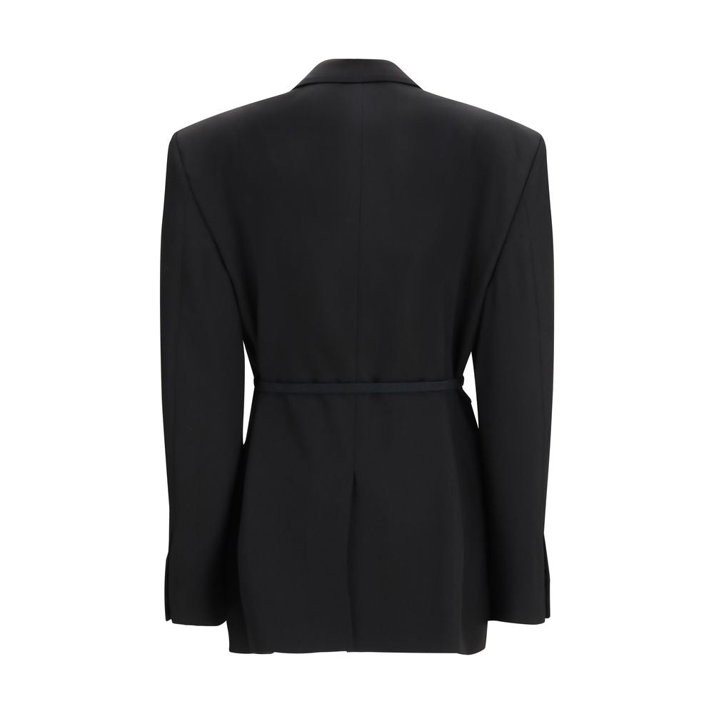 Veste en laine noire Balenciaga, style élégant, avec détails modernes, portée sur mannequin.