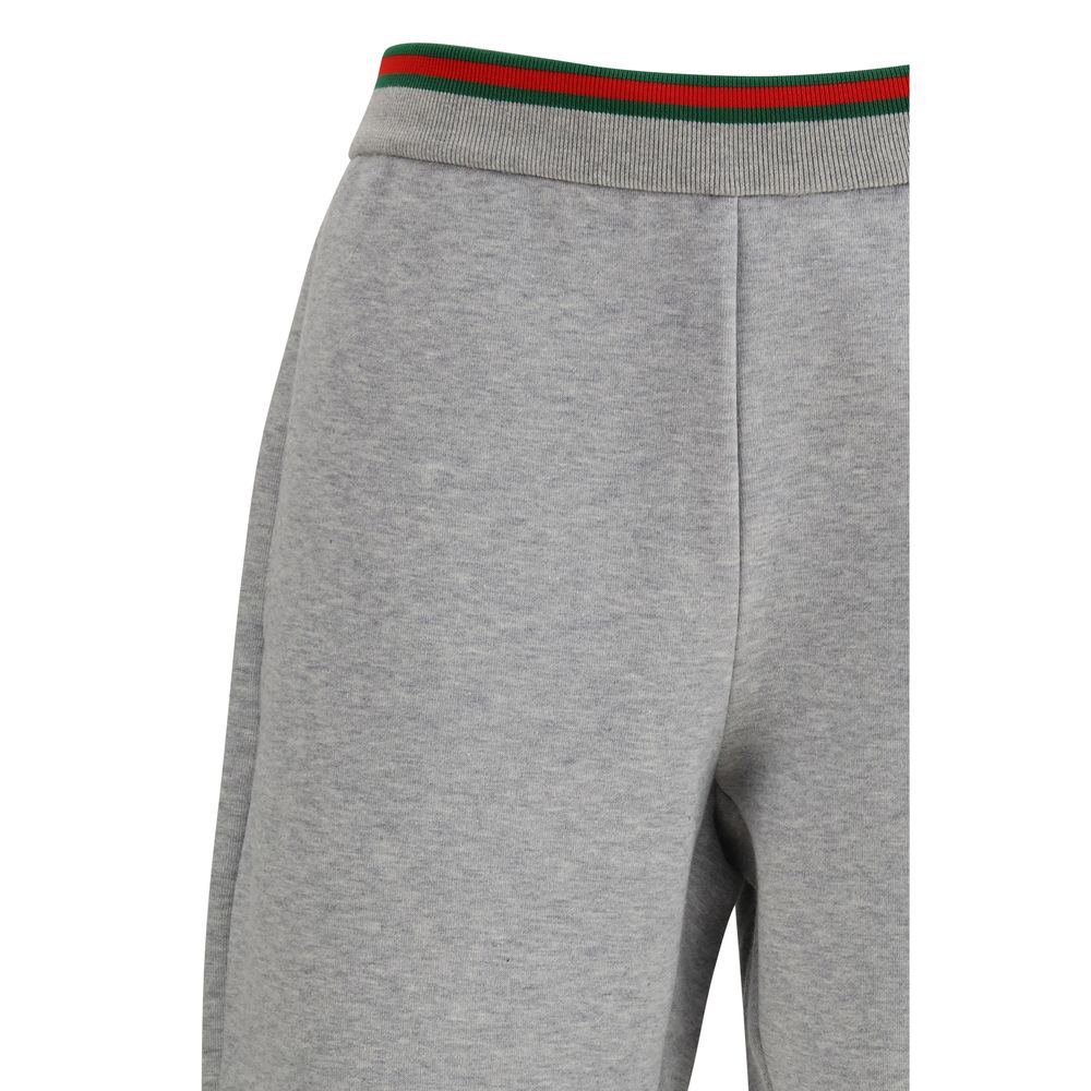 Pantalon en coton gris de style décontracté de Gucci, coupe confortable et design élégant, visible sur l'image.