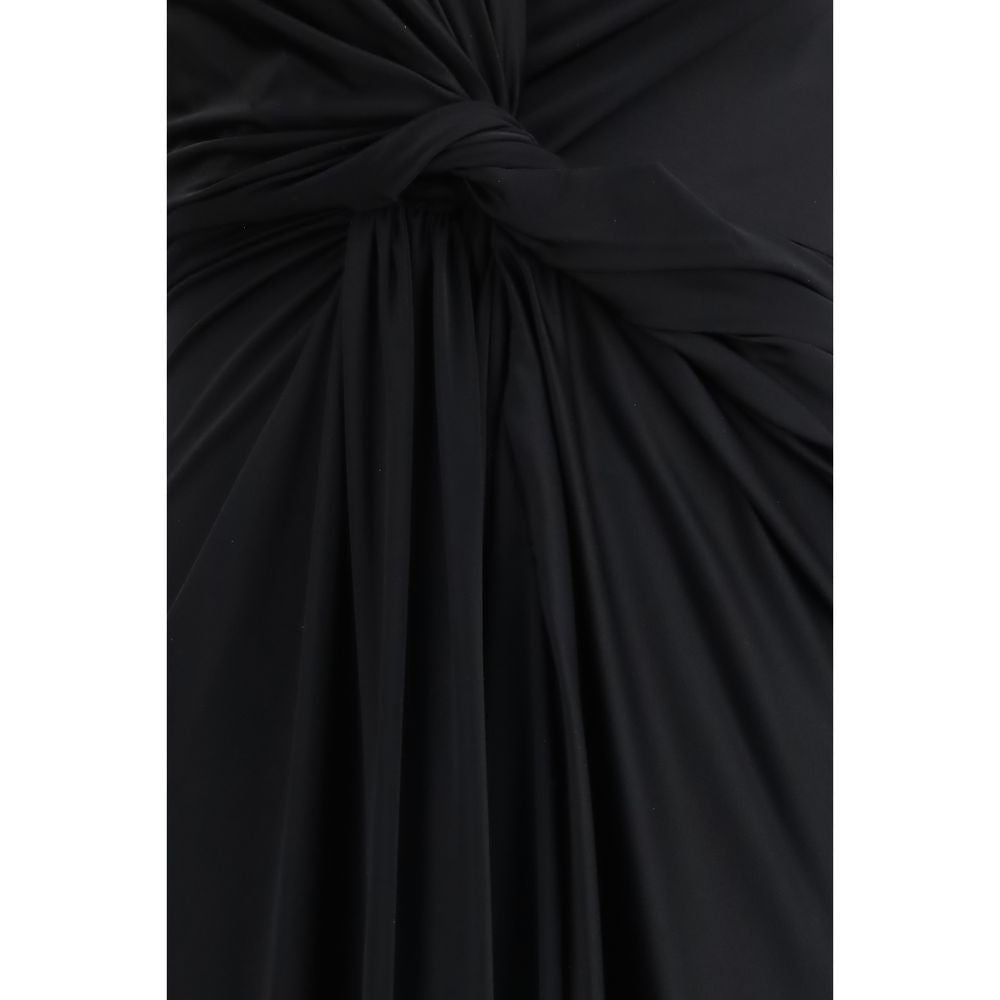 Robe décontractée noire en polyamide de Balenciaga, coupe fluide et élégante, portée en style casual.
