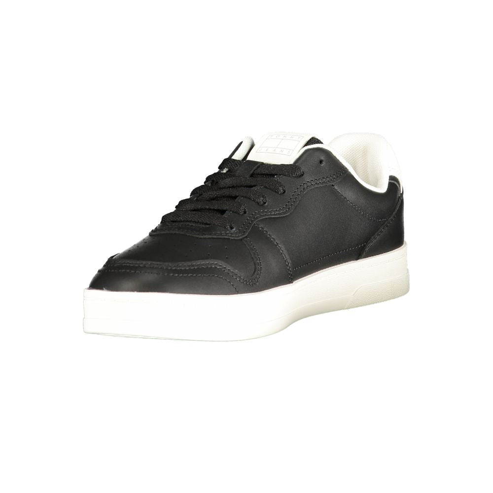 Chaussures sneakers en polyuréthane noir pour femmes de la marque Tommy Hilfiger, vue de côté.