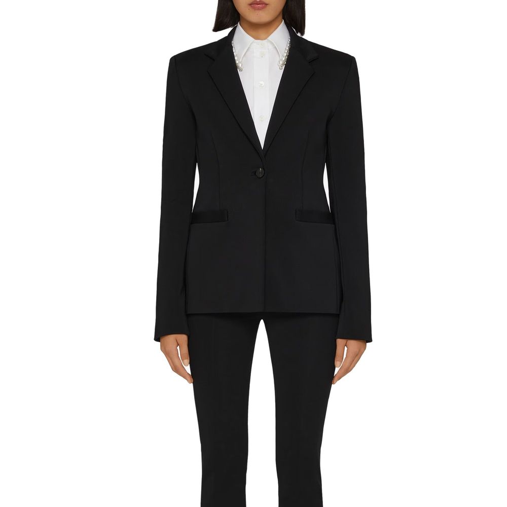 Veste blazer noire en élasthanne Givenchy, coupe élégante et moderne, détail de couture visible, tissu lisse et sophistiqué.