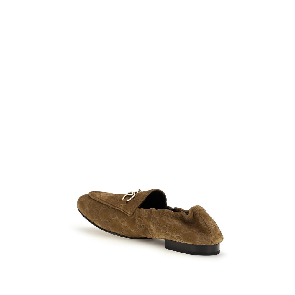 Mocassins Gucci en cuir de veau marron Bos Taurus, sans lacets, avec design élégant et semelles en cuir.